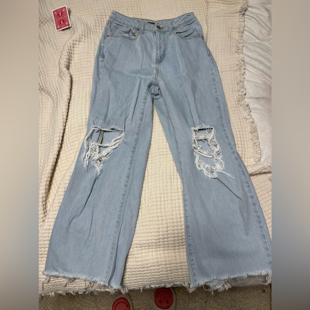 Oversized distressed denim jeans